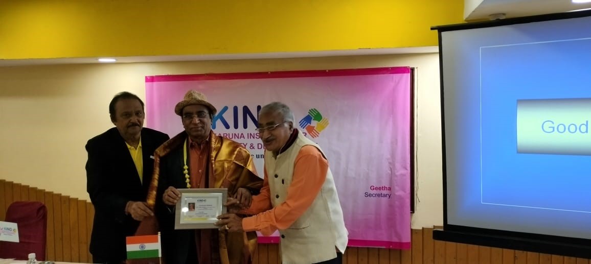Prof CMKR being honoured by KIND Foundation